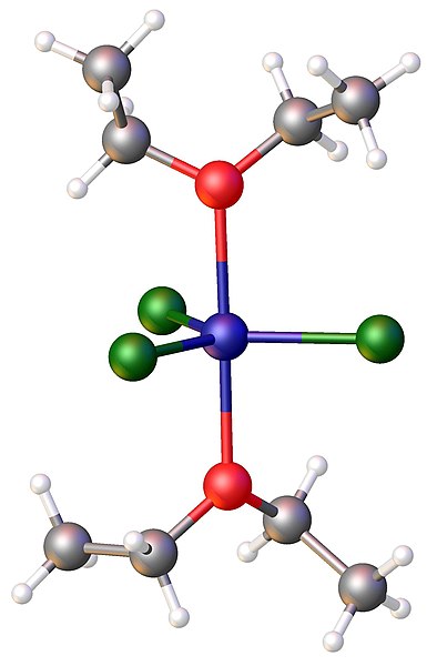 Structure of FeCl3(diethylether)2. Color code: Cl=green,Fe = blue, O = red.
