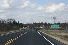 Looking north along Wisconsin Highway 173 at the community's border road sign, March 2012 Valley Junction Wisconsin Sign Looking North WIS173.jpg