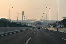 The 1.48 kilometres (0.92 mi) long Yingbin Elevated Road connects the airport with S1 and G4 expressways.