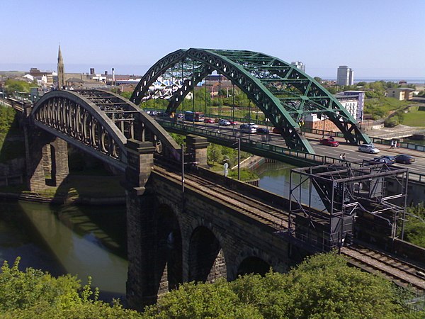 The Monkwearmouth Railway Bridge (left) alongside the Wearmouth Road Bridge (right) in Sunderland, seen in 2006.