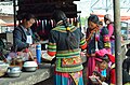 Yi women groop at the market, China