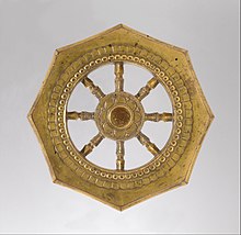 The Dharmachakra, (Japanese: 輪宝, Rinpo) sometimes called Treasure Wheel is used by the Nichiren Shoshu sect as the symbol of the Dai Gohonzon mandala on its altar.