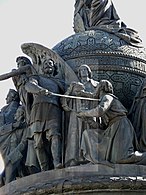 מיכאיל הראשון - מייסד שושלת רומנוב, קוזמה מינין נותן את כובע המונומך (אנ') למיכאיל, ודמיטרי פוז'ארסקי מגן עליו.