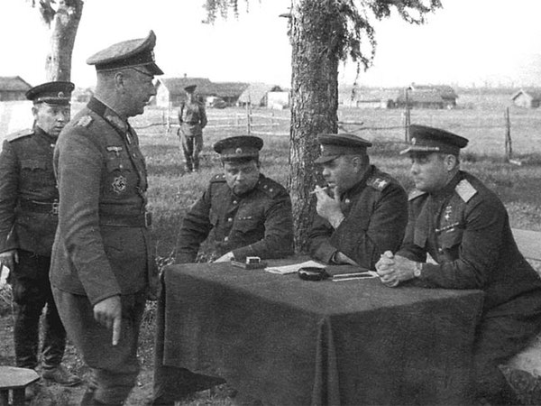 Field Marshal Aleksandr Vasilevsky and General Ivan Chernyakhovsky interrogate General Alfons Hitter (standing) after the battle of Vitebsk.