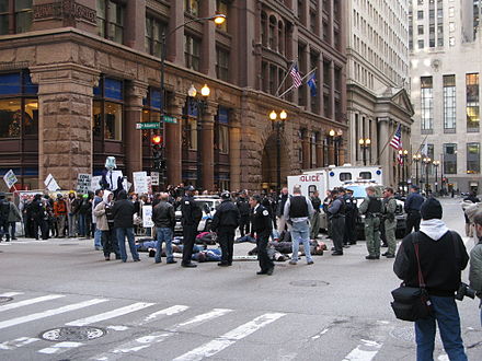 Chicago Climate Justice activists protesting cap and trade legislation in front of Chicago Climate Exchange building in Chicago Loop