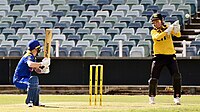 Katie Mack plays a paddle scoop during a WNCL match ... and narrowly avoids being caught by wicket-keeper Beth Mooney 2022-23 WNCL WA v ACT 22-09-25 Mack (09).jpg