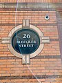 File:26 Bleecker Street, New York City address sign, and rainbow refraction in photograph.jpg