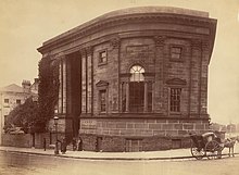 Sydney Public Library, corner of Bent & Macquarie, Sydney, 1877. This building has since been demolished. A089193r (25180409795).jpg