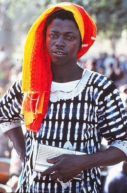 ASC Leiden - W.E.A. van Beek Collection - Dogon portraits 01 - Young man just returned from Abidjan, with his radio, Tireli, Mali 1985.jpg