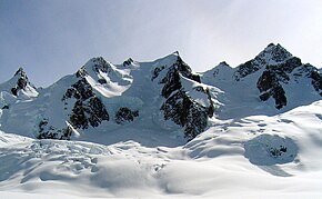 Austerity Mountain to right, with Adamant Mountain centered and The Stickle at far left. Adamant Mountain N.jpg