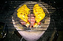 Chicken legs are being barbequed in Assam, India. Barbequed Chicken legs.jpg