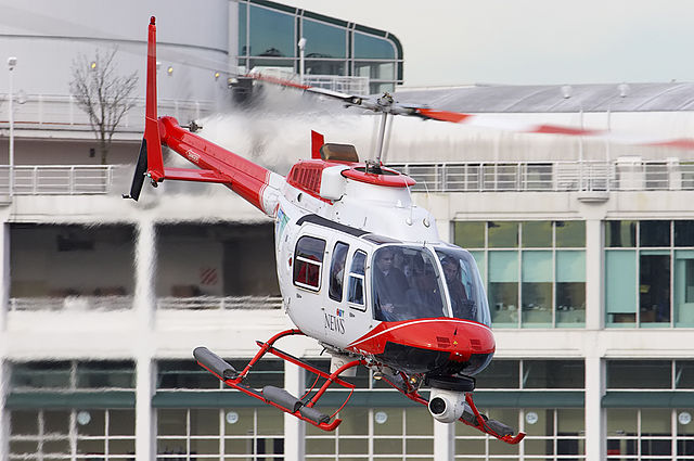A Bell 206L-4 Long Ranger IV (operated by CTV British Columbia), departing Vancouver Harbour helipad