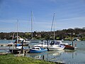 Several boats moored at Wootton Creek, Wootton, Isle of Wight. It is seen from New Road.