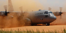 C-130 Hercules performs a tactical landing on a dirt strip, North Carolina, U.S.