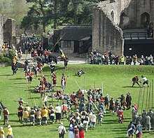 Reenactment of an assault by Parliamentarian forces upon Caldicot Castle Caldicot castle breached.jpg