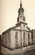 Church of the Transfiguration (built 1801 as Zion Protestant Episcopal Church bought 1853 by Catholic Archdiocese of New York) on the corner of Mott and Mosco Streets. The parish was founded by Padre Félix Varela y Morales in 1827[5]