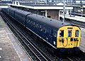 A Class 501 EMU in Rail Blue calls at Harrow and Wealdstone