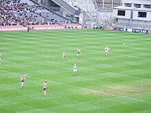 Portumna (blue and yellow) in the 2009-10 All-Ireland Senior Club Hurling Championship final against Ballyhale Shamrocks (green); Croke Park, 17 March 2010. Croke Park St Patrick's Day 2010.jpg