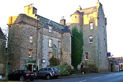 Dornoch Castle, also known as Dornoch Palace, held by the Earls of Sutherland in the 16th century, it is now a hotel. Dornoch Castle Hotel (11470644786).jpg