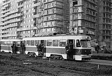 An overcrowded V54 is seen running on Pantelimon Avenue in Bucharest, 15 October 1975 Electroputere V54 on Pantelimon Avenue.jpg