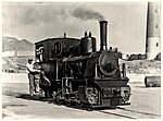 En las obras del Puerto de Adra (Almeria) en 1934 se utilizo una locomotora para el transporte de piedra desde la cantera.jpg