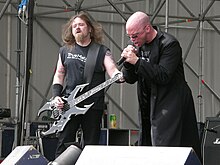 Jacques Belanger and Rob Cohen performing with Exciter in 2005 Exciter bass&vocals.jpg