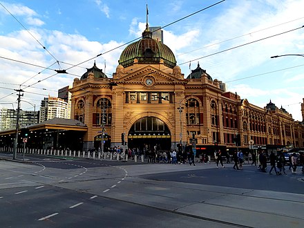 View showing the repainted facade of Flinders Street in softer colours, including expanded forecourt with new security bollards in May 2019