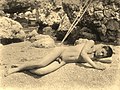 ? 0198 recto. Ragazzo nudo su spiaggia / Nude boy laying on seashore. "Deponirt 04 Okt 1901". [Duplicate number].