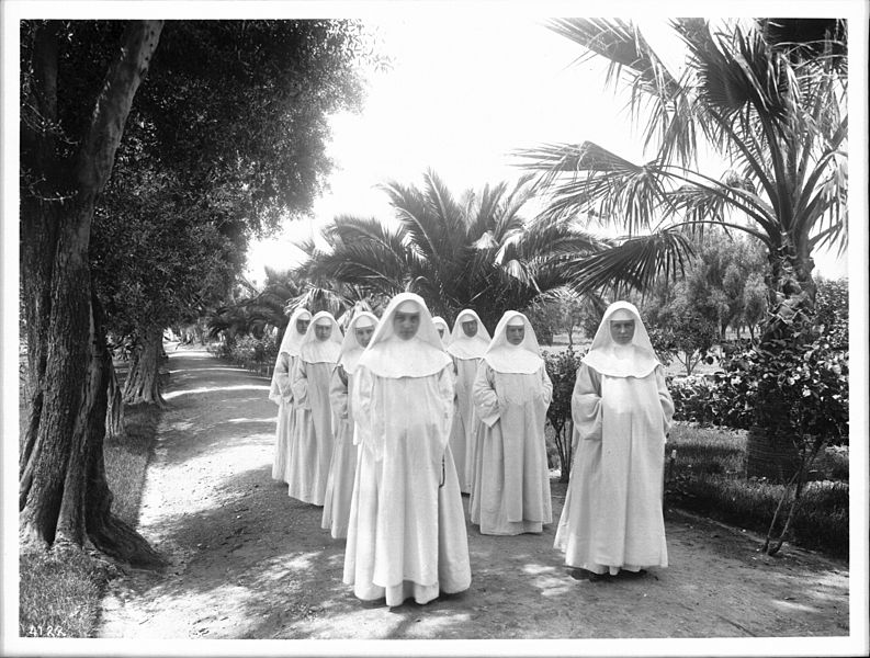 File:Group of eight Dominican sisters processing in the garden at their convent at Mission San Jose, ca.1906 (CHS-4122).jpg