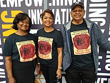 Members of the Guyana Philatelic Society with T-shirts showing the stamp Guyana Philatelic Society members with British Guiana 1c magenta t-shirts (2).jpg