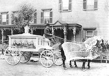 A horse-drawn hearse with driver, circa 1900, Scranton, Pennsylvania, USA. Horse-drawn funeral hearse 1900.jpg