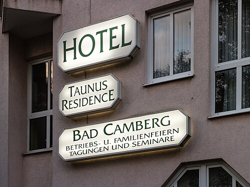 Hotel Taunus-Residence in Bad Camberg. Billboard on facade of hotel.