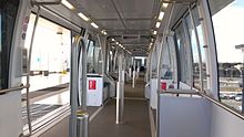 Interior of cable car used on BART Oakland Airport line.jpg