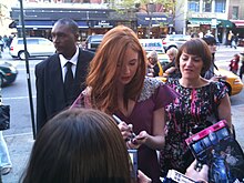 Karen Gillan (centre) was reportedly genuinely upset filming the death scene of the older version of the Doctor. Karen Gillan 2010.jpg