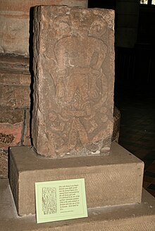 Loki stone, Kirkby Stephen parish church, part of a 10th-century Viking-age cross-shaft. But does it show Loki or Satan? LokiStone England.jpg