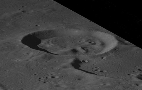 Oblique view facing south from Apollo 8 McClure crater AS08-13-2219.jpg