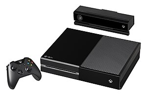 Xbox One (Frontansicht)alt=Ur-Modell der Xbox One mit Kinect-Kamera und dazugehörigem Gamepad