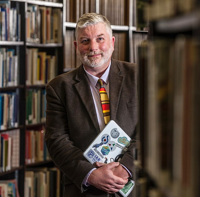 Mike Dickison in the Auckland Museum Library