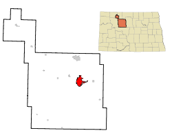 ノースダコタ州におけるウォード郡（右上図）とマイノットの位置の位置図