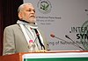 Parshottam Rupala addressing the inaugural session of the International Symposium on Drafting a National Policy on Medicinal and Aromatic Plants of India, in New Delhi.jpg