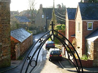 Pattishall: Looking along the Crescent through the church gate Pattishall as seen through church gate.jpg