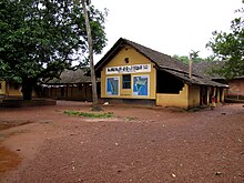 A school building in Kannur, India Perumacheri AUP School.JPG