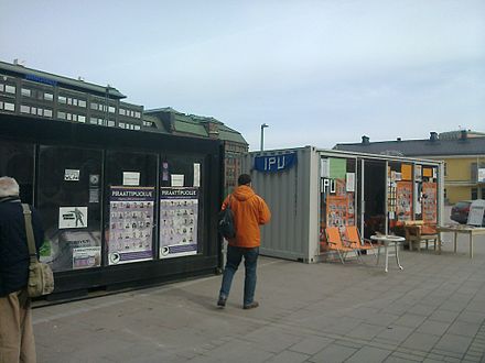 Election campaign stations for the Pirate Party and Independence Party on Narinkkatori in Helsinki.