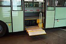 A bus in Prague with wheelchair lift extended, 2006 Praha, DOD 2006 Hostivar, Plosina autobusu Karosa pro invalidy.JPG