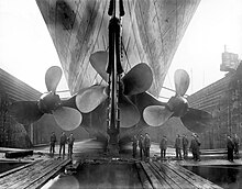 RMS Olympic, sister ship of Titanic, photographed in dry dock, Belfast RMS Olympic's propellers.jpg