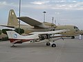 O-1 Bird Dog and C-130 Hercules