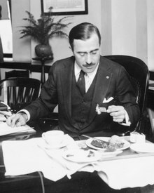 Richard Gilder Cholmeley-Jones, Director of the War Risk Bureau, eating lunch at his desk Richard Gilder Cholmeley-Jones, Director of the War Risk Bureau, eating lunch at his desk LCCN90713038 (cropped).tif