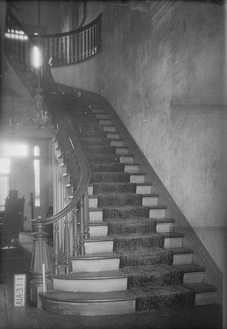 The main staircase in the entrance hall Rocky Hill Castle 03.jpg