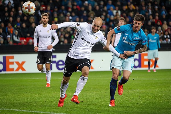 Reginiussen chasing a ball with Zenit Saint Petersburg's player Emiliano Rigoni in the UEFA Europa League match in November 2017.