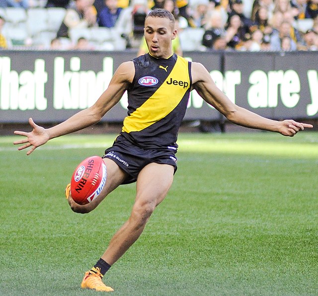 Bolton kicks during play in round 13, 2017